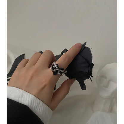 Black locked heart ring